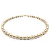 Set Aur Galben 14 k, Colier, Bratara si Cercei Tortita Model Lalea cu Perle Naturale Crem de 7-8 mm si Inchizatori Filigranate